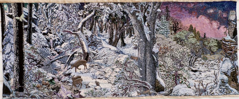 Images of the forest covered in snow, deer eating.